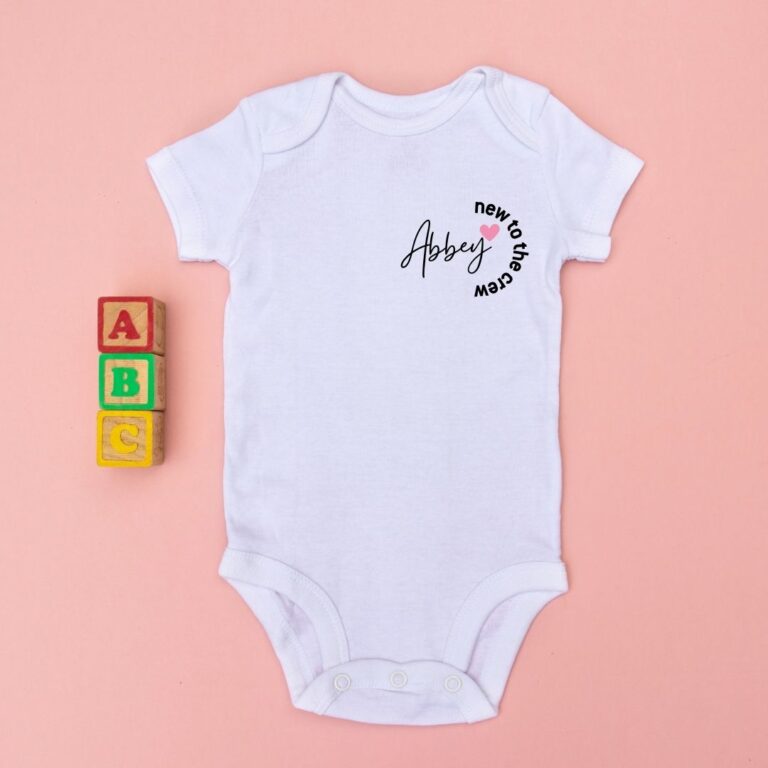 white babygrow pink heart